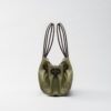Lori Aldaron kaki leather bag Caroline De Marchi